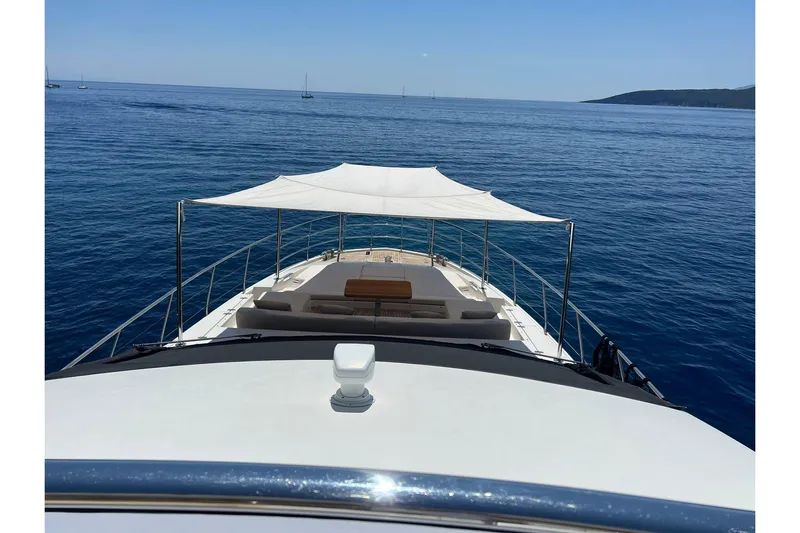  Yacht Photos Pics Luxurious 2015 Azimut 80 yacht cruising on serene blue waters.