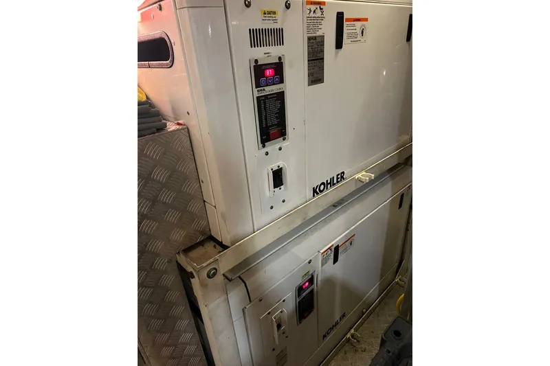  Yacht Photos Pics Kohler generator units inside a 2015 Azimut 80 yacht engine room.