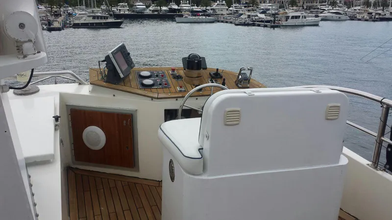  Yacht Photos Pics Helm of 2005 Cantieri Nord Est Navalmeccanica Navetta yacht with marina view.