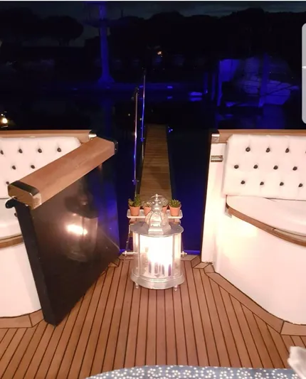  Yacht Photos Pics Luxurious 2005 Cantieri Nord Est yacht deck with elegant seating and ambient lighting.