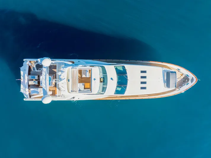  Yacht Photos Pics Overhead view of a 2013 Azimut 105 yacht on clear blue water.