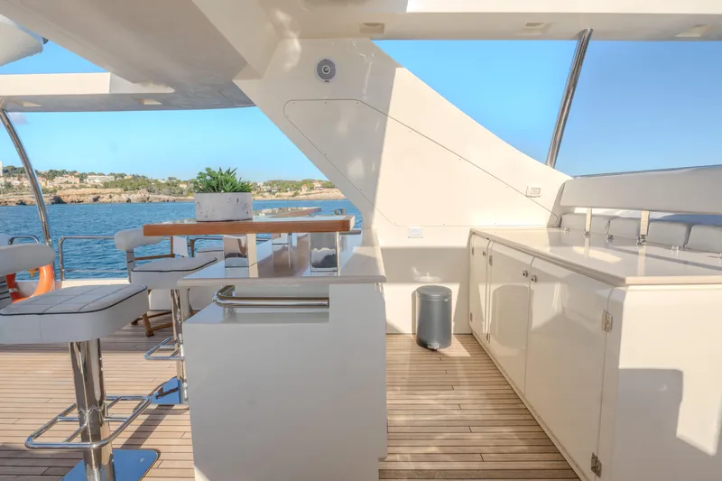  Yacht Photos Pics Luxurious 2013 Azimut 105 yacht deck with modern seating and ocean view.