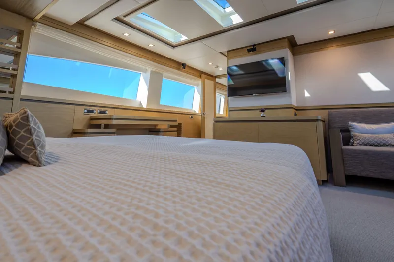  Yacht Photos Pics Luxurious interior of 2013 Azimut 105 yacht with modern design and large windows.