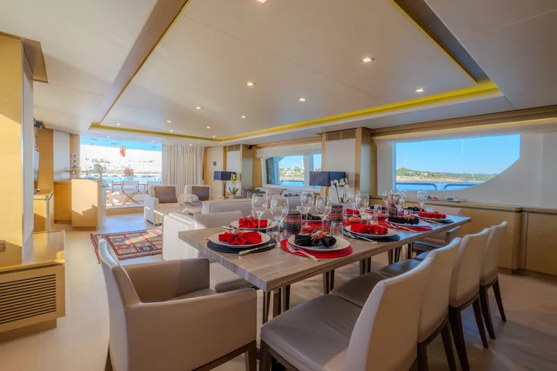  Yacht Photos Pics Luxurious interior of 2013 Azimut 105 yacht with elegant dining area and scenic views.