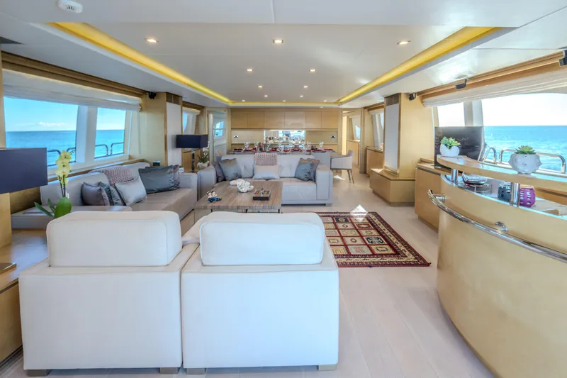  Yacht Photos Pics Luxurious interior of 2013 Azimut 105 yacht with elegant seating and ocean views.