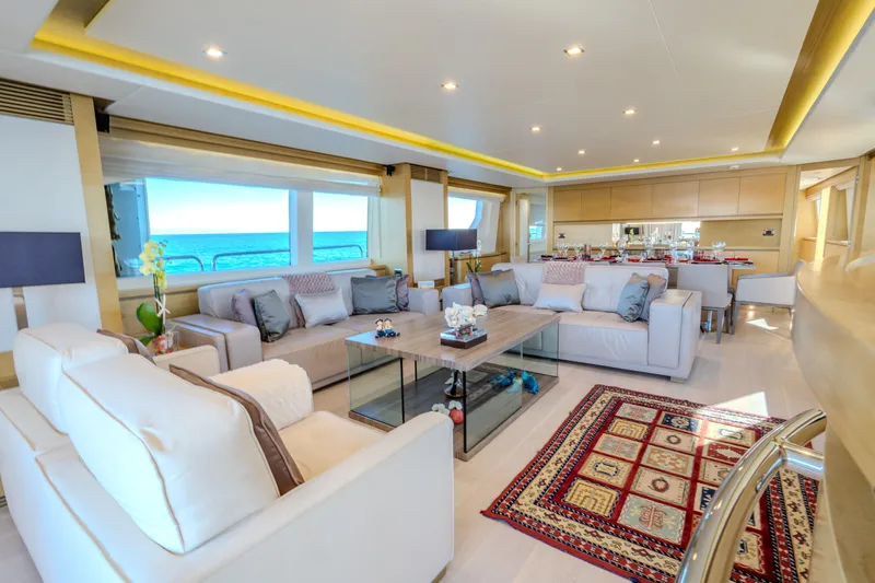  Yacht Photos Pics Luxurious interior of 2013 Azimut 105 yacht with elegant seating and ocean view.