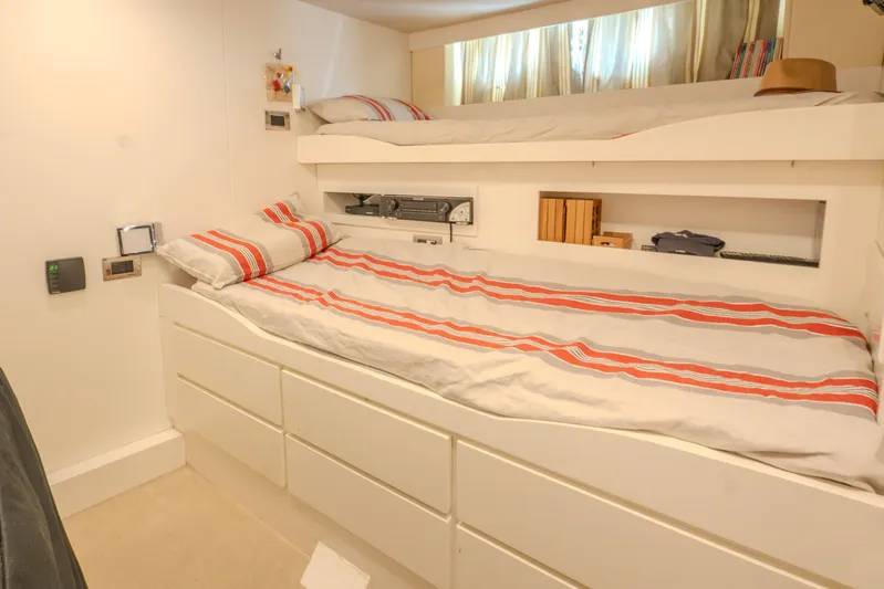  Yacht Photos Pics Cozy cabin interior of 2013 Azimut 105 yacht with bunk beds and storage.