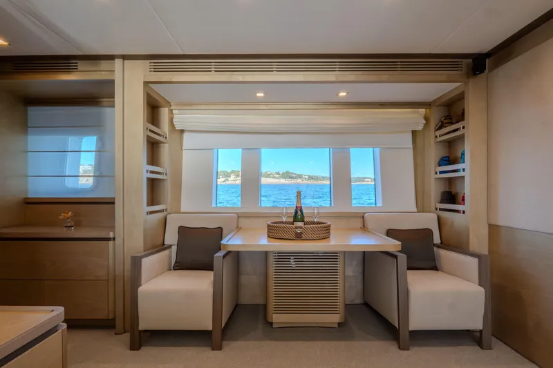  Yacht Photos Pics Luxurious interior of 2013 Azimut 105 yacht with ocean view and elegant seating area.