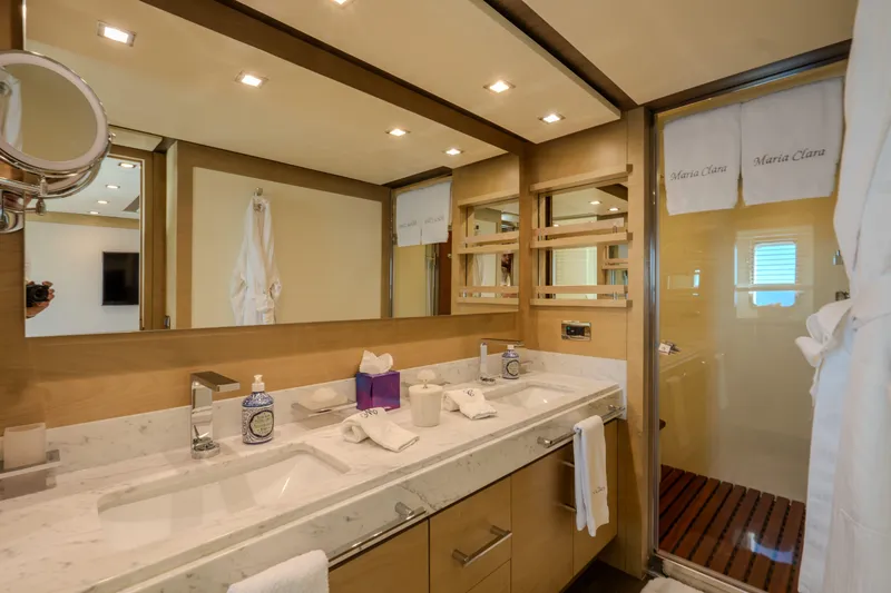  Yacht Photos Pics Luxurious bathroom in 2013 Azimut 105 yacht with elegant fixtures and modern design.