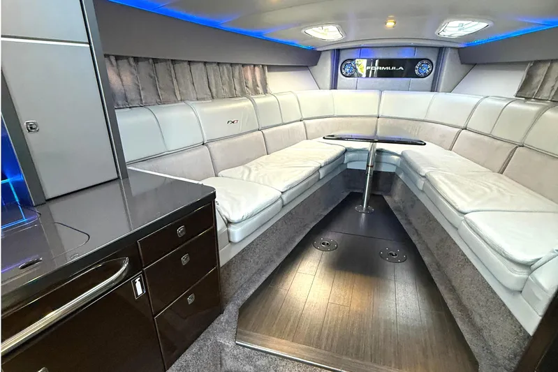  Yacht Photos Pics Luxurious interior of a 2015 Formula 400 Super Sport boat with modern seating and lighting.