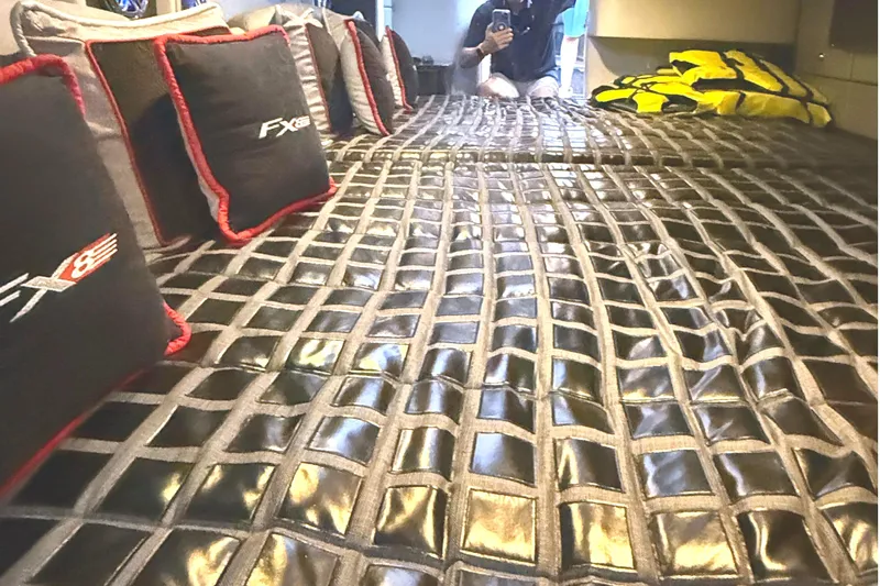  Yacht Photos Pics Interior cabin of 2015 Formula 400 Super Sport with luxury bedding and cushions.