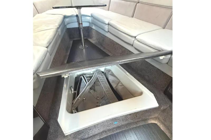  Yacht Photos Pics Interior view of 2015 Formula 400 Super Sport boat with open storage compartment.
