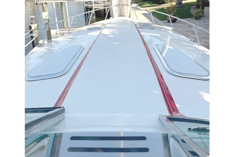 Yacht Photos Pics 2015 Formula 400 Super Sport yacht docked, showcasing sleek deck design and marina view.