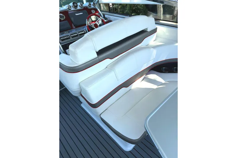  Yacht Photos Pics Luxurious interior of 2015 Formula 400 Super Sport boat with white seating and red accents.