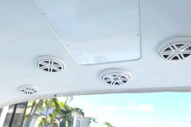  Yacht Photos Pics Ceiling speakers on a 2015 Formula 400 Super Sport boat under a clear blue sky.