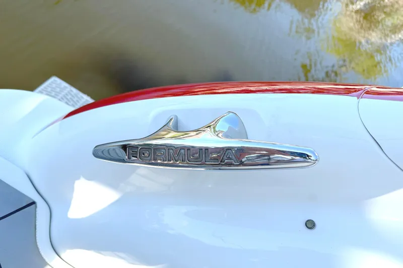  Yacht Photos Pics Chrome "Formula" emblem on 2015 Formula 400 Super Sport boat, close-up view.