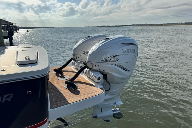  Yacht Photos Pics 2022 Regulator 34 boat with twin Yamaha XTO outboard engines on a sunny day.