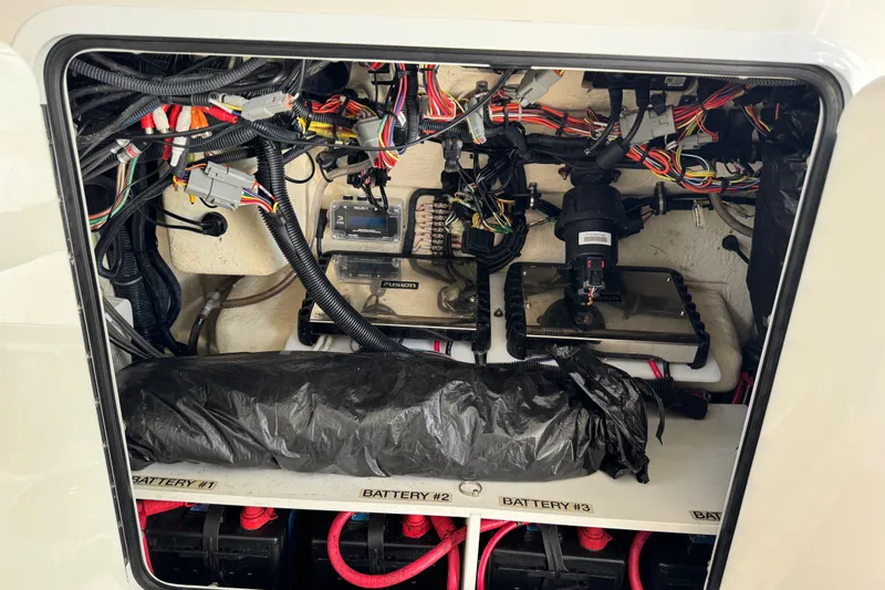  Yacht Photos Pics Electrical wiring and battery compartment of a 2022 Regulator 34 boat.