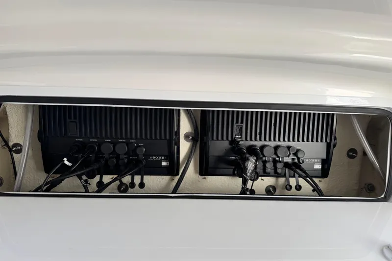  Yacht Photos Pics Electrical panel inside 2022 Regulator 34 boat, featuring multiple connections and wiring.