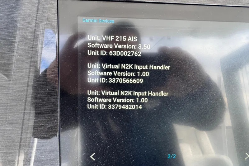  Yacht Photos Pics Garmin device display on 2022 Regulator 34, showing software versions and unit IDs.