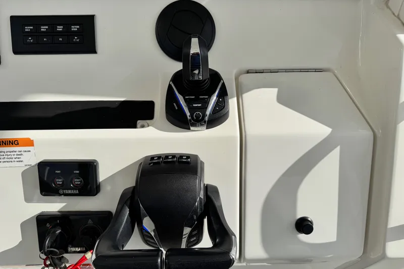  Yacht Photos Pics Control panel of 2022 Regulator 34 boat featuring Yamaha throttle and switches.