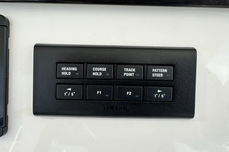  Yacht Photos Pics Control panel on a 2022 Regulator 34 boat with Yamaha navigation buttons.