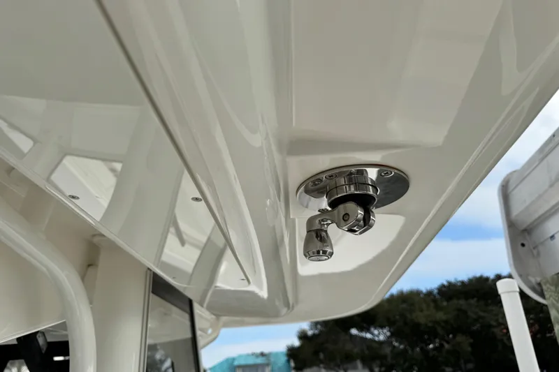  Yacht Photos Pics 2022 Regulator 34 boat detail showing stainless steel fitting under hardtop.