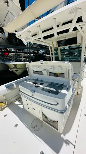  Yacht Photos Pics 2013 Boston Whaler 320 Outrage boat interior with fishing station and storage.