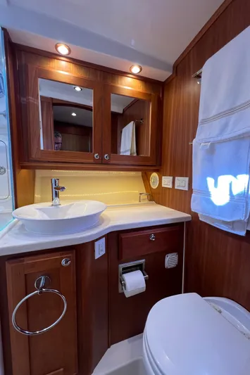 Family Affair Ix Yacht Photos Pics Luxurious bathroom in 2018 Sabre 45 Salon Express yacht with wood cabinetry and modern fixtures.
