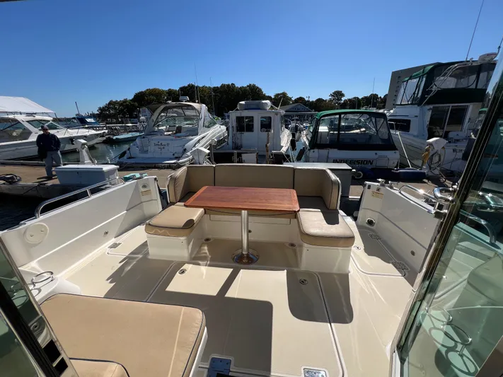 Family Affair Ix Yacht Photos Pics 2018 Sabre 45 Salon Express yacht with spacious outdoor seating area at marina.