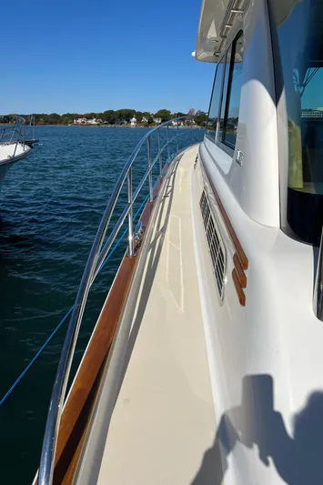 Family Affair Ix Yacht Photos Pics 2018 Sabre 45 Salon Express yacht on calm water, side view.