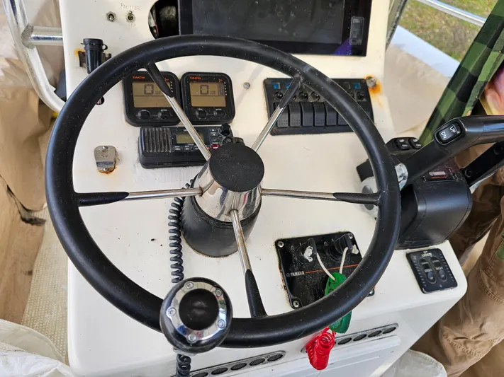 Ocean Spirit Yacht Photos Pics Steering console of a 1996 Eduardono RIB boat with navigation instruments.