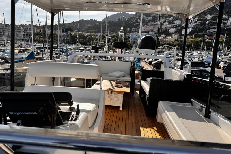  Yacht Photos Pics Luxurious 1998 Cantieri Lombardi 48 S yacht interior with marina view.