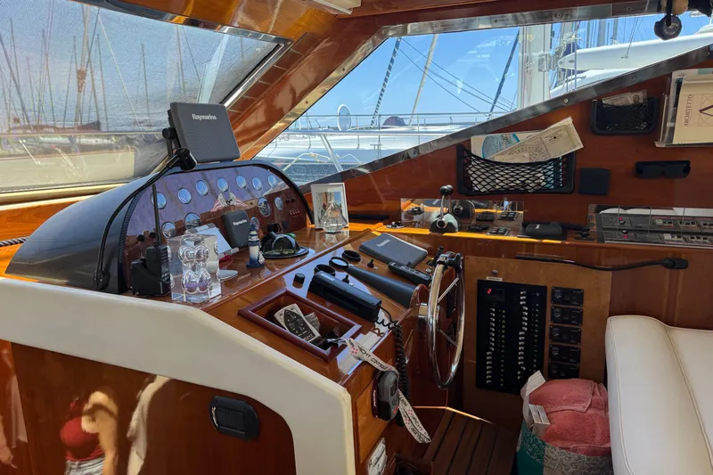  Yacht Photos Pics Cockpit of 1998 Cantieri Lombardi 48 S yacht with navigation equipment and controls.