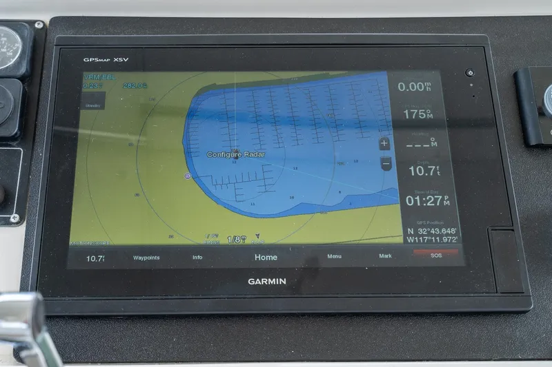 Freedom Yacht Photos Pics Garmin GPS display on 2002 McKinna 57 Pilothouse showing navigation and radar settings.