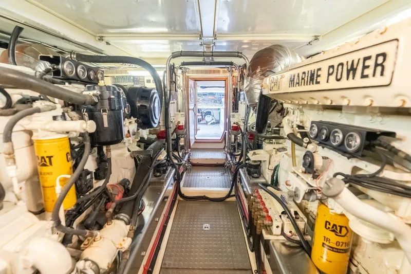 Freedom Yacht Photos Pics Engine room of 2005 Offshore Yachts Pilothouse with CAT marine power systems.
