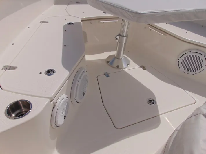 Reel Time Yacht Photos Pics 2013 Boston Whaler 370 Outrage boat interior with seating and storage compartments.