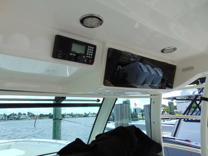 Reel Time Yacht Photos Pics Interior view of 2013 Boston Whaler 370 Outrage boat with electronic controls.