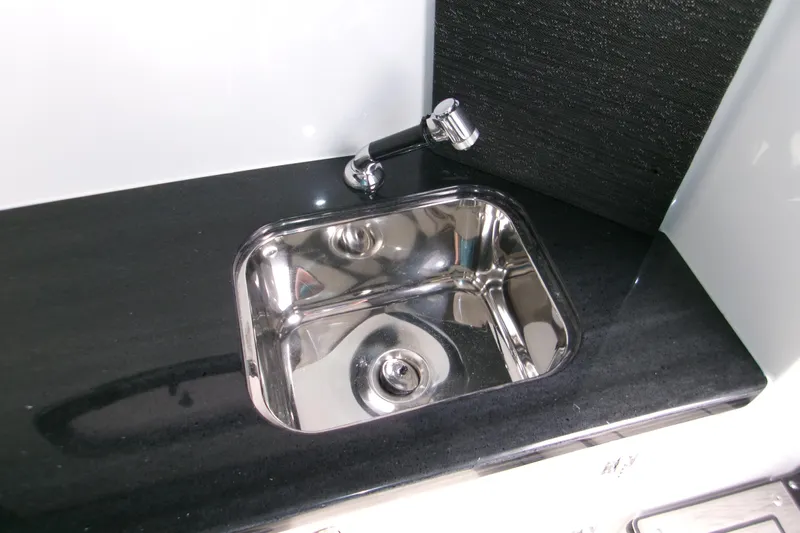  Yacht Photos Pics Stainless steel sink in 2026 Monterey Elite 30 OB boat interior.