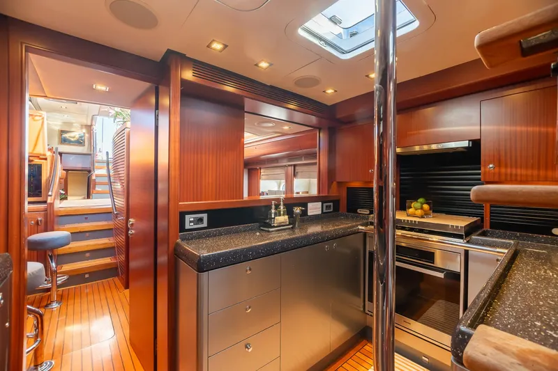 Assai Yacht Photos Pics Luxurious kitchen interior of 2011 Alia Yachts Warwick 82 LK with modern appliances.