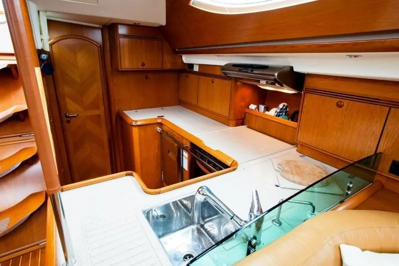 Rum Runner Yacht Photos Pics Luxurious kitchen interior of 2007 Jeanneau Sun Odyssey 54 DS yacht.