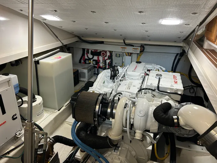  Yacht Photos Pics Engine room of a 2015 Back Cove 34 boat, featuring a clean and organized layout.