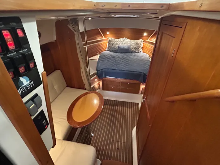  Yacht Photos Pics 2015 Back Cove 34 interior cabin with bed, seating, and wooden finishes.