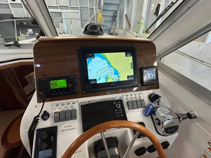  Yacht Photos Pics Helm of 2015 Back Cove 34 boat with navigation and control systems.