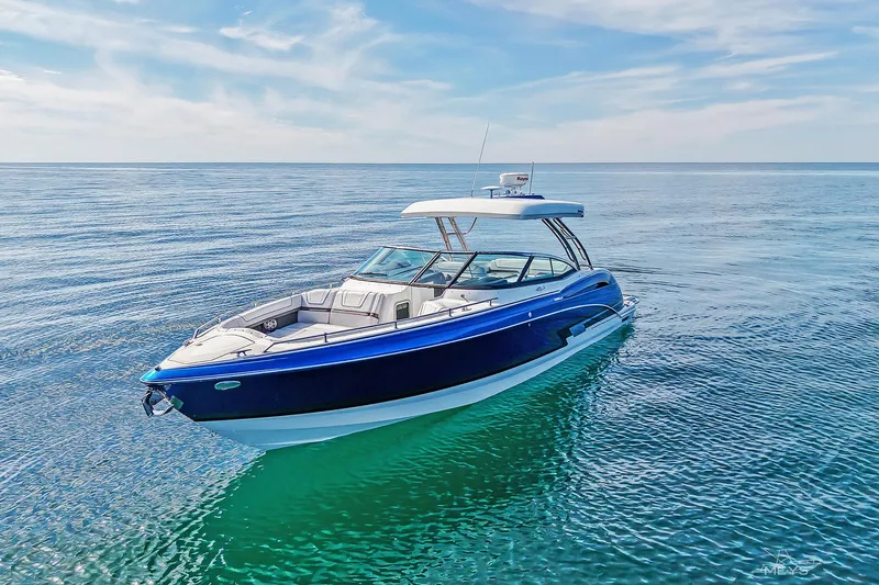  Yacht Photos Pics 2018 Formula 350 FX Crossover Bowrider on calm ocean waters under blue sky.