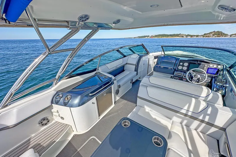  Yacht Photos Pics 2018 Formula 350 FX Crossover Bowrider interior with luxurious seating and modern dashboard.