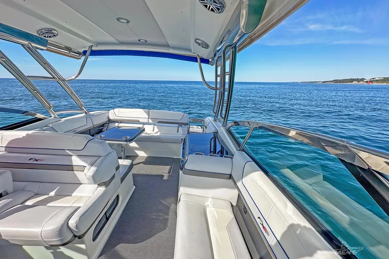  Yacht Photos Pics 2018 Formula 350 FX Crossover Bowrider on open water, featuring luxurious seating and sleek design.