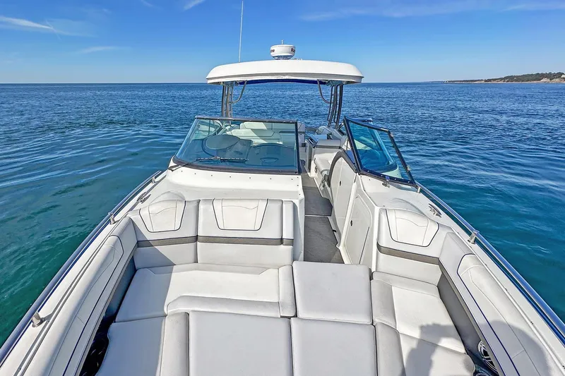  Yacht Photos Pics 2018 Formula 350 FX Crossover Bowrider on open water, showcasing spacious seating and sleek design.