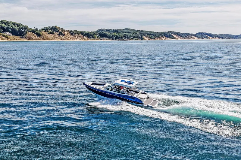  Yacht Photos Pics 2018 Formula 350 FX Crossover Bowrider cruising on scenic coastal waters.