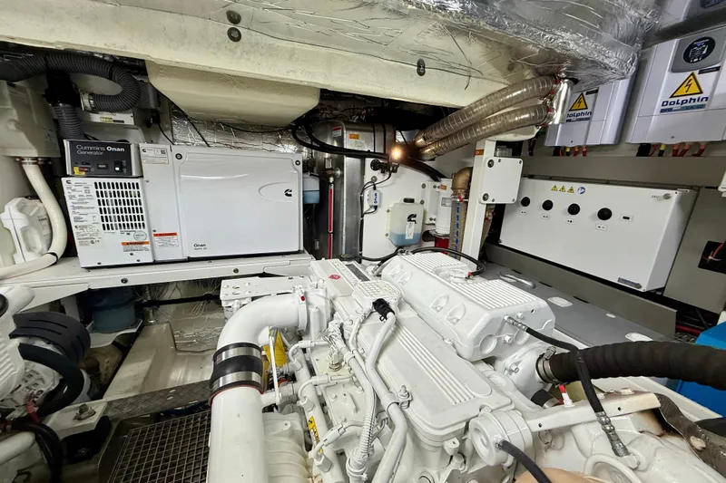 Freiheit Yacht Photos Pics Engine room of a 2020 Prestige 590 yacht with Cummins Onan generator.
